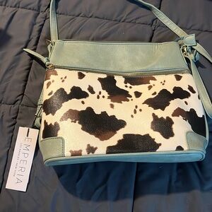 Green and cow print purse